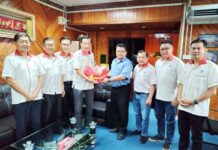 周亚玖率咬中华商会理事拜会县长商被要求拆除铁闸门储水箱事宜