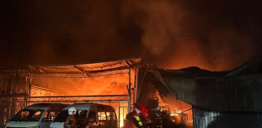 Three warehouses, 12 vehicles destroyed in Penampang industrial park fire